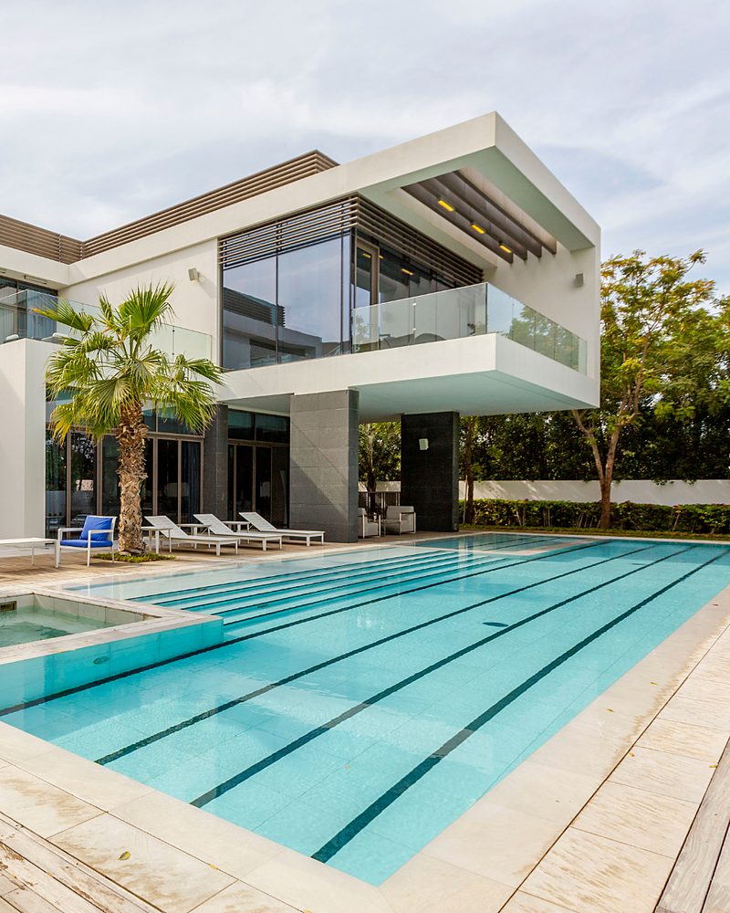 Contemporary home with a swimming pool and outdoor living area